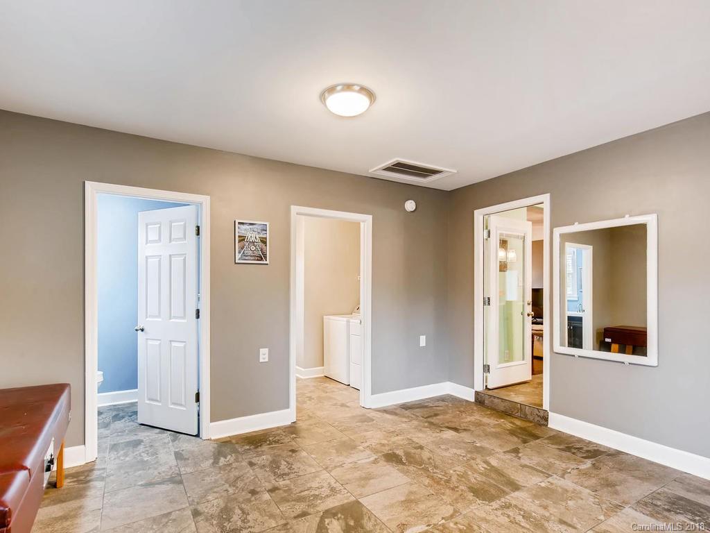 2411 Medlin Road Monroe, NC 28112 - Photo 24 of 27 wooden floor and windows in a room