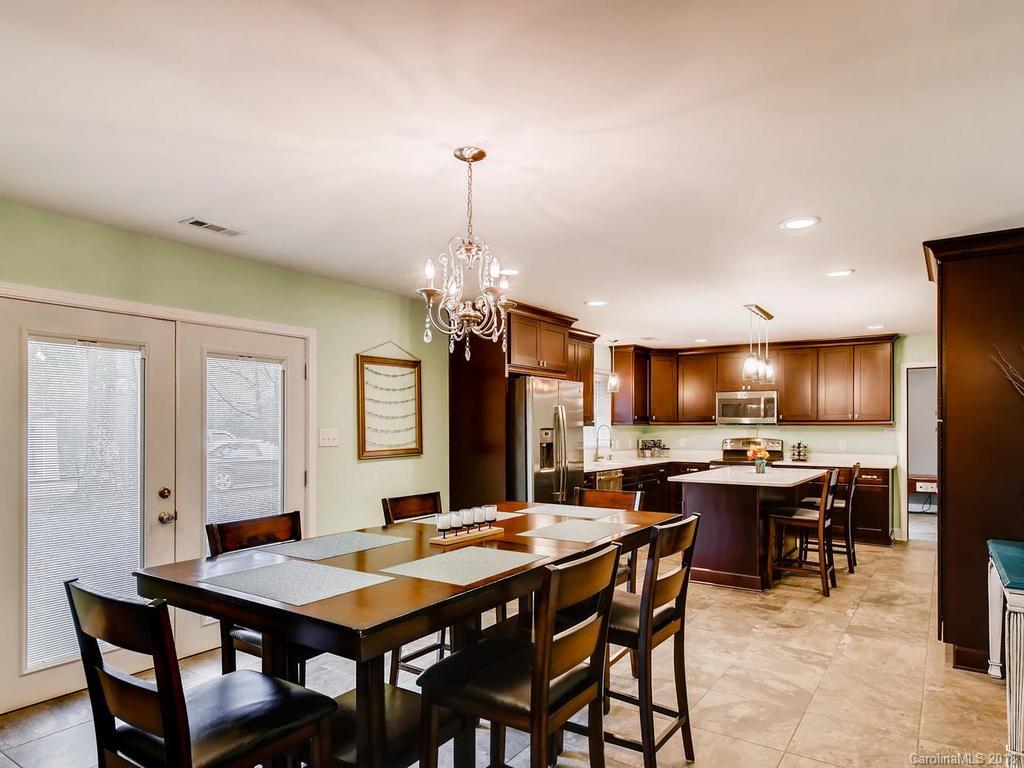 2411 Medlin Road Monroe, NC 28112 - Photo 10 of 27 a view of a dining room with furniture