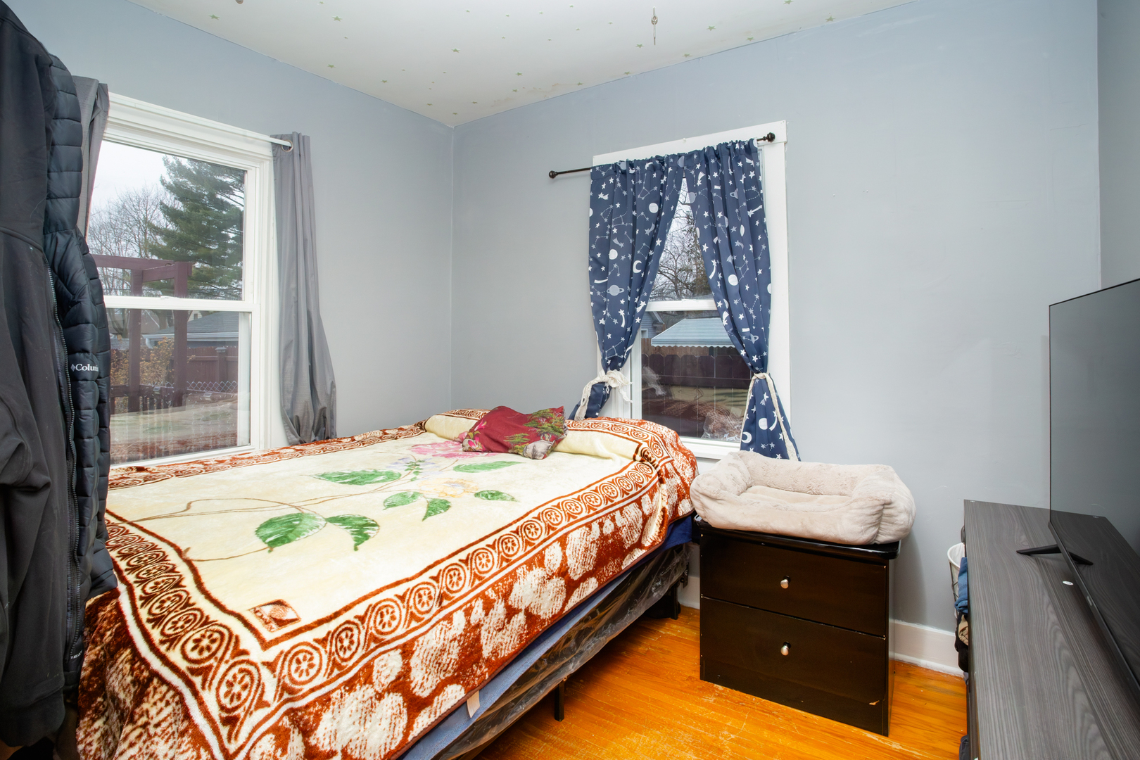 683 Columbia Avenue Elgin, IL 60120 - Photo 14 of 29 a bed sitting in a bedroom next to a window
