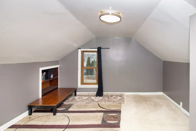 a room with furniture and window