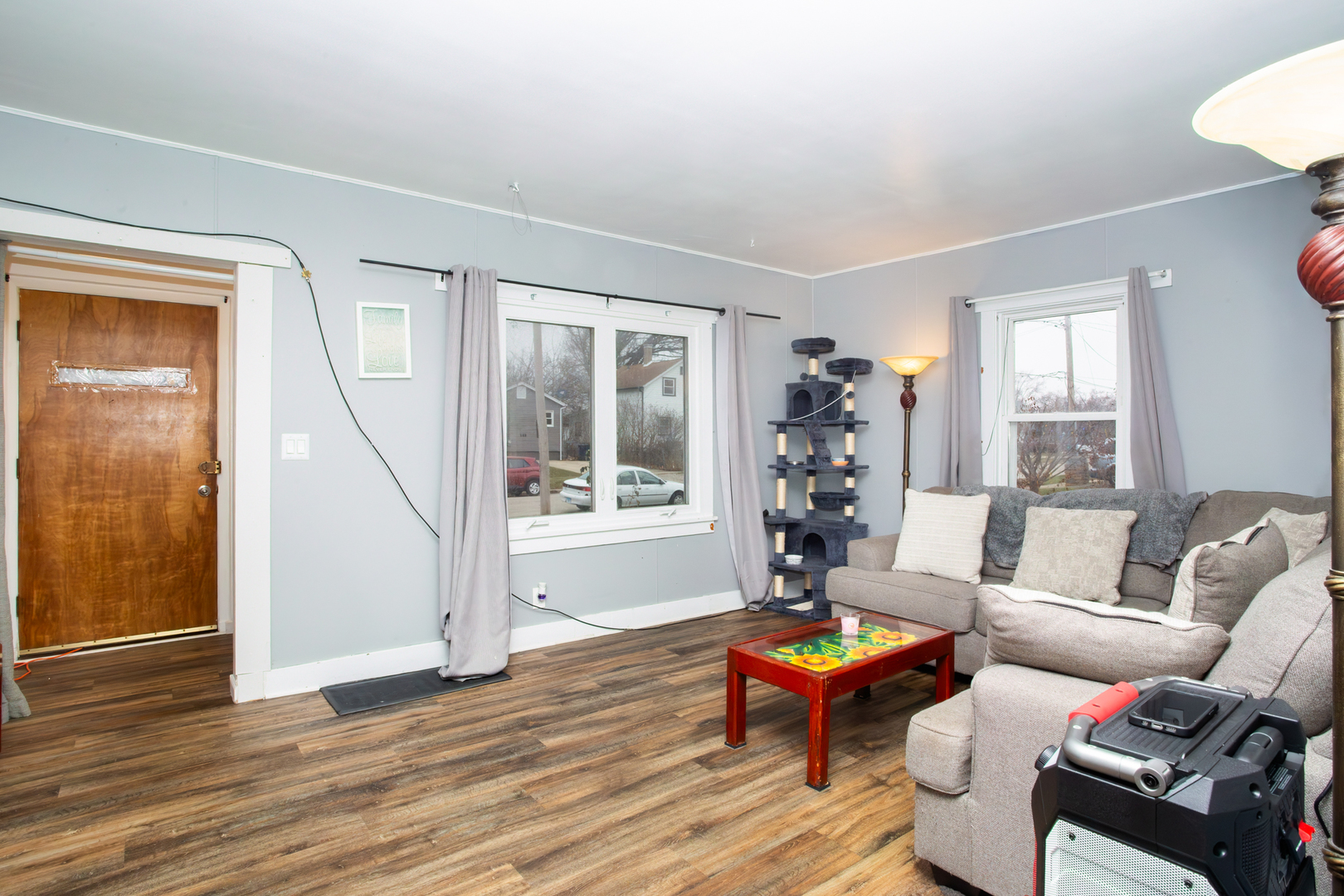 683 Columbia Avenue Elgin, IL 60120 - Photo 5 of 29 a living room with furniture and a window