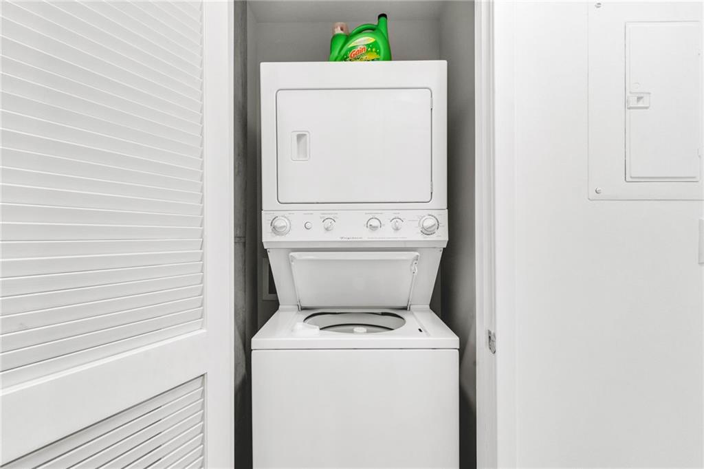 3324 Peachtree Road Northeast, Unit 1813 Atlanta, GA 30326 - Photo 18 of 34 a utility room with dryer and washer