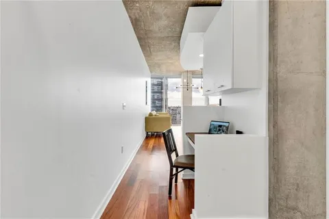a view of kitchen with wooden floor