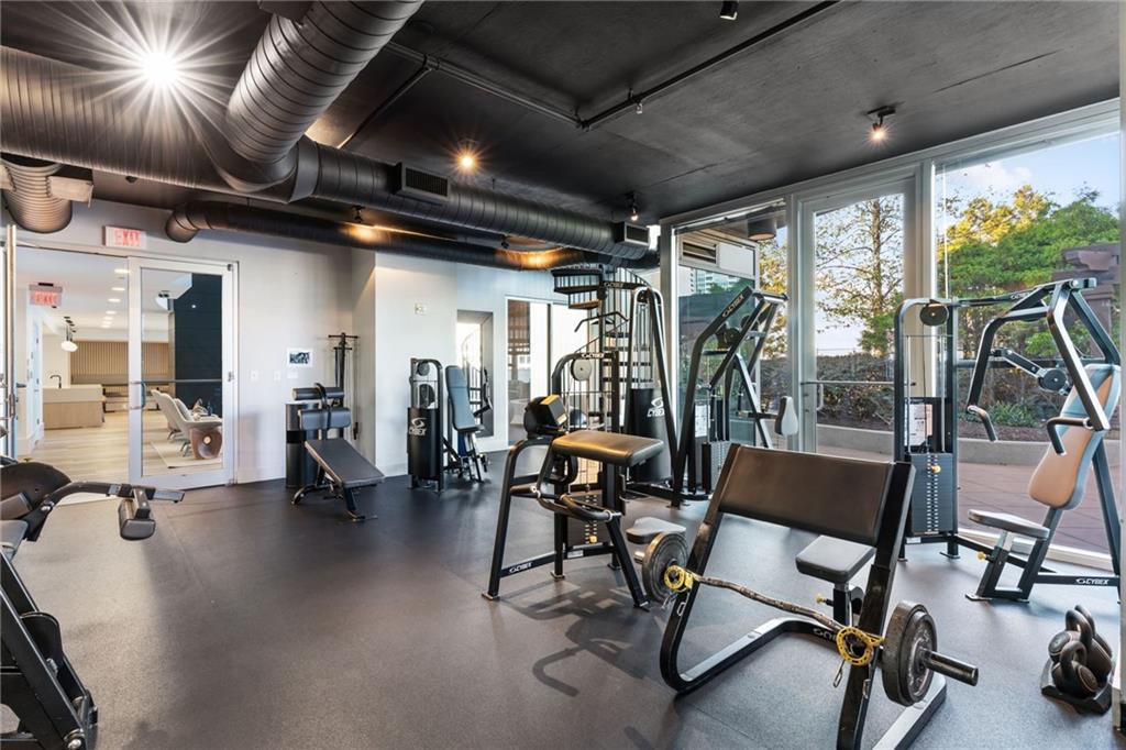 3324 Peachtree Road Northeast, Unit 1813 Atlanta, GA 30326 - Photo 28 of 34 a view of a room with gym equipment