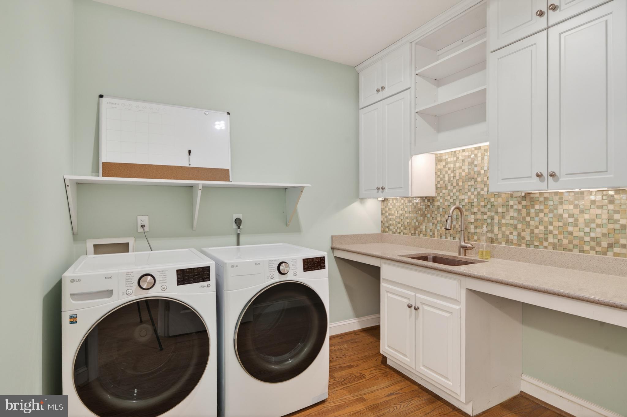 11 Harrison Drive Newtown Square, PA 19073 - Photo 29 of 80 Stylish laundry room with modern finishes.