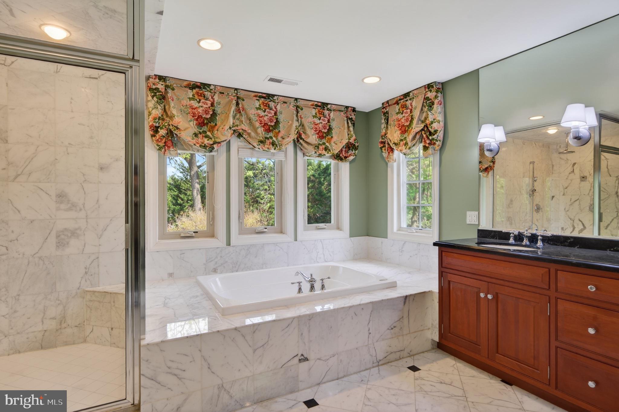11 Harrison Drive Newtown Square, PA 19073 - Photo 42 of 80 Elegant marble bath with natural light.