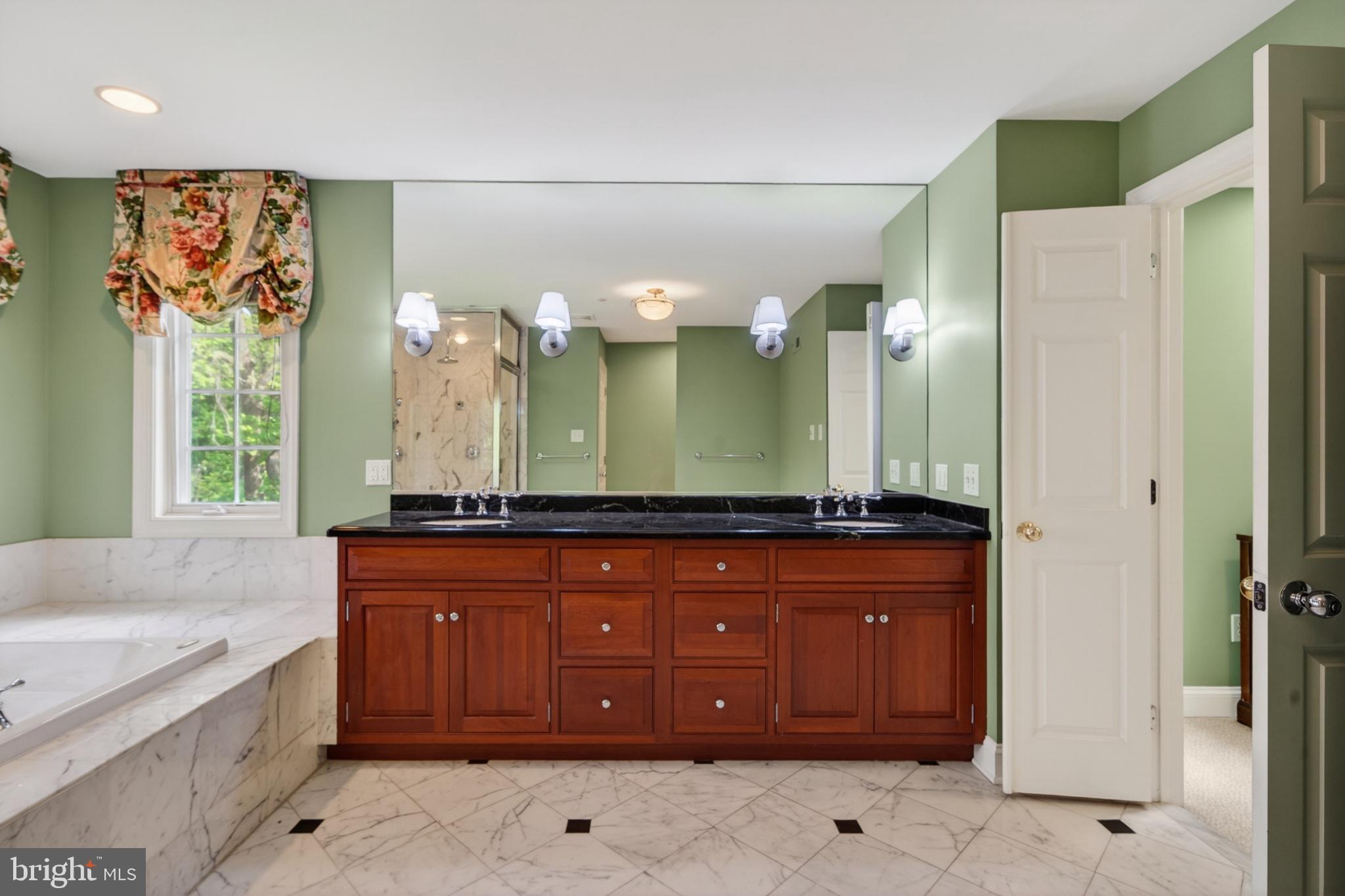 11 Harrison Drive Newtown Square, PA 19073 - Photo 43 of 80 Elegant bathroom with rich wood accents.