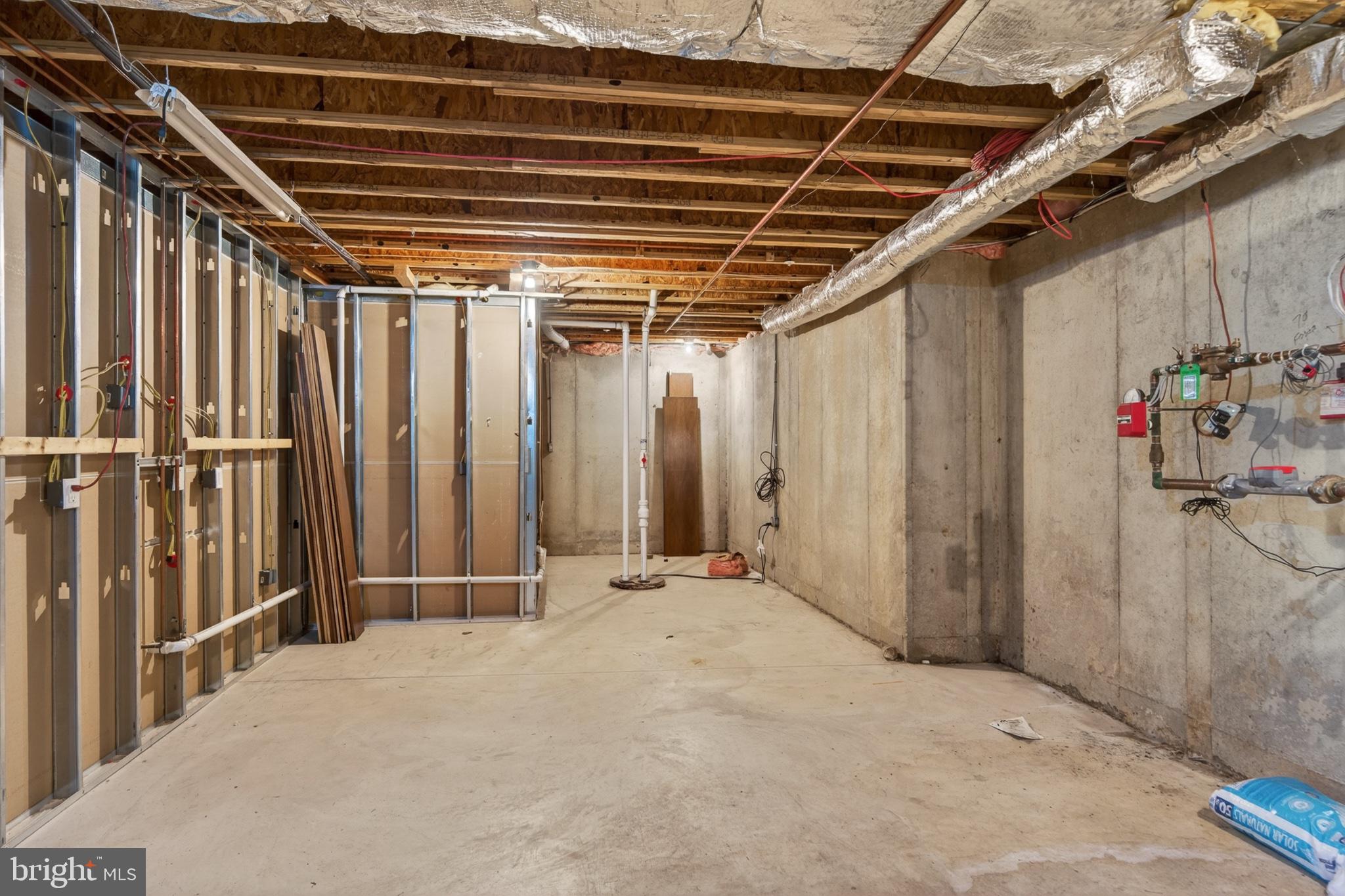 11 Harrison Drive Newtown Square, PA 19073 - Photo 65 of 80 Spacious unfinished basement awaits ideas.