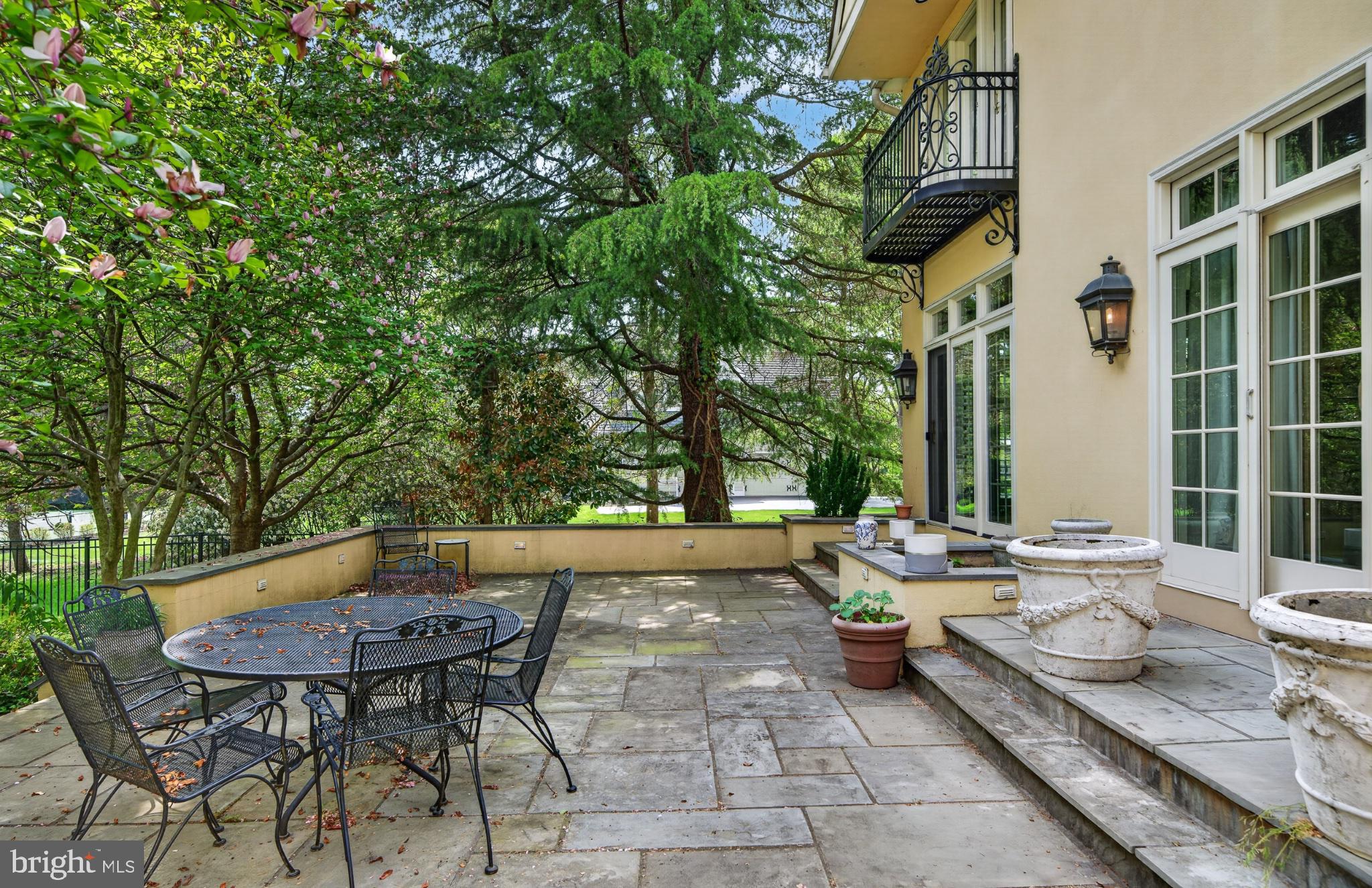 11 Harrison Drive Newtown Square, PA 19073 - Photo 66 of 80 Serene patio with lush greenery.