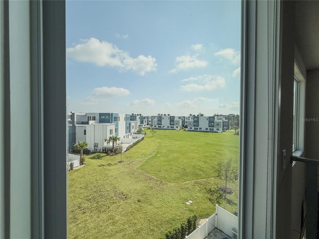 7770 Sandy Ridge Drive, Unit 231 Reunion, FL 34747 - Photo 25 of 25 a view of a city from a balcony