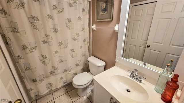 a bathroom with a sink and toilet
