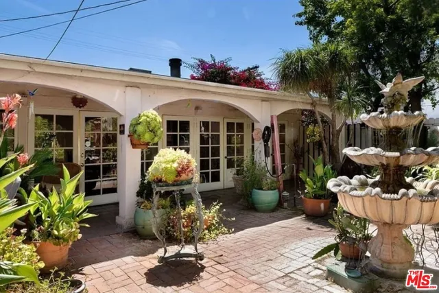 a view of a building with a glass door