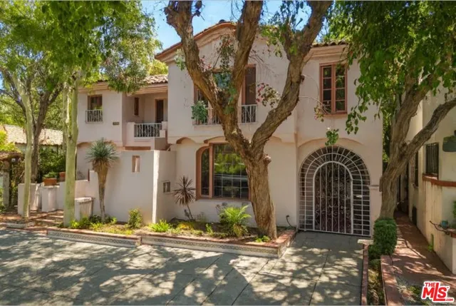 a front view of a building with street view