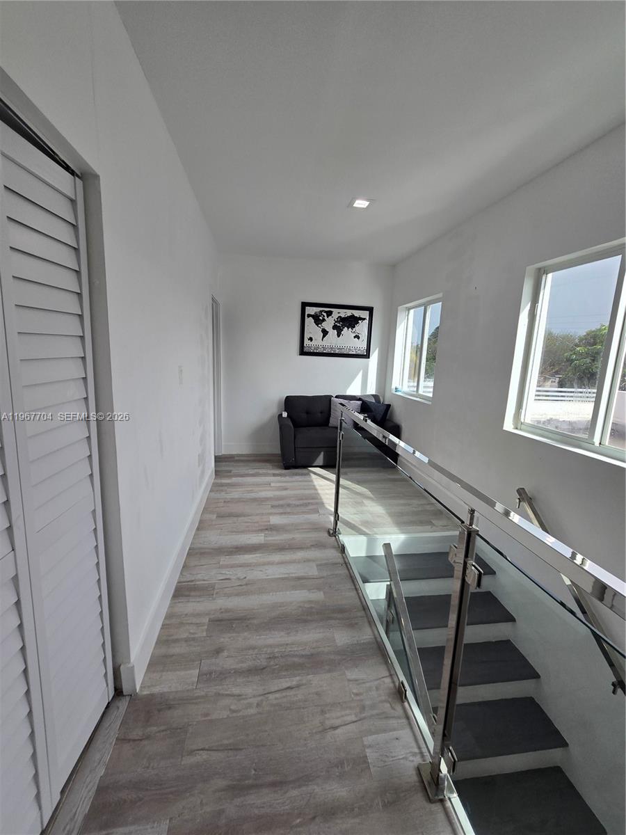 1453 Northwest 70th Street Miami, FL 33147 - Photo 14 of 19 a living room with furniture