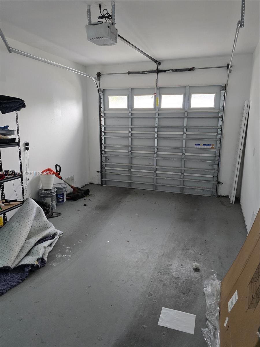 1453 Northwest 70th Street Miami, FL 33147 - Photo 19 of 19 a view of room with gym equipment