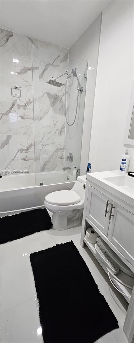 1453 Northwest 70th Street Miami, FL 33147 - Photo 8 of 19 a bathroom with a double vanity sink toilet and shower