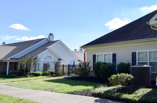 a view of a yard with an outdoor space