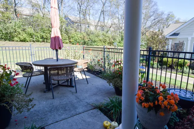 a view of a table and chairs in patio