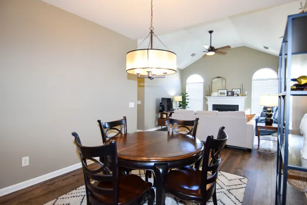 a kitchen with a refrigerator a stove top oven a sink and dishwasher