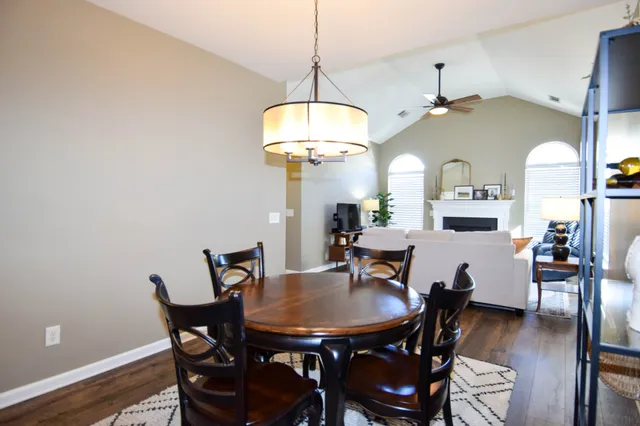 a kitchen with a refrigerator a stove top oven a sink and dishwasher