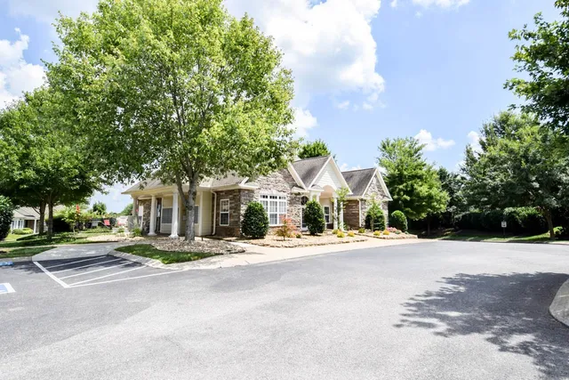 a view of a house with swimming pool