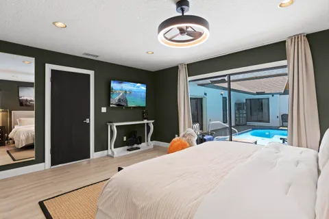 a bedroom with a bed and a walk in closet