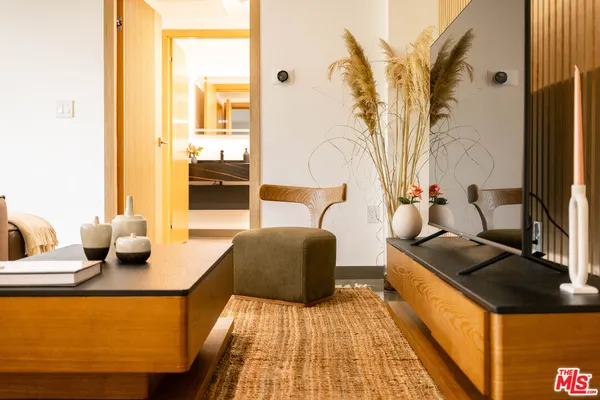 a living room with furniture and a table