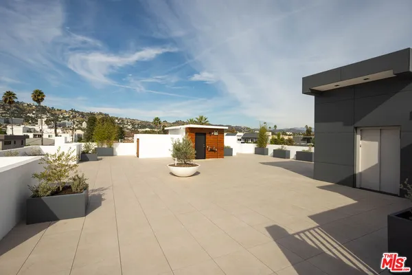 a view of a swimming pool with a house