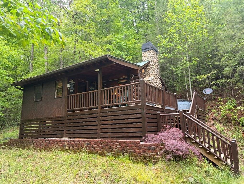 1790 Stanley Creek Road Cherry Log, GA 30522 - Photo 1 of 31 a view of house with a yard