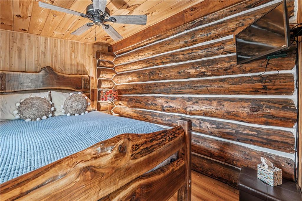1790 Stanley Creek Road Cherry Log, GA 30522 - Photo 12 of 30 a bedroom with a bed and a dresser