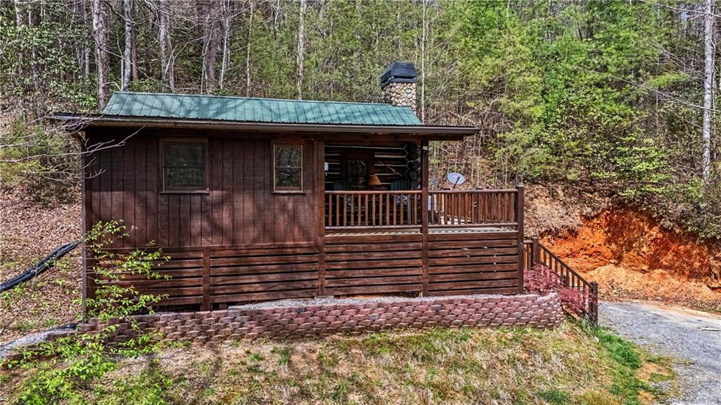 1790 Stanley Creek Road Cherry Log, GA 30522 - Photo 29 of 30 a view of house with a window and wooden fence