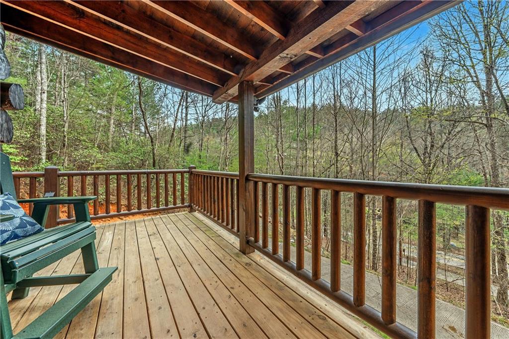 1790 Stanley Creek Road Cherry Log, GA 30522 - Photo 3 of 30 a view of balcony with wooden floor
