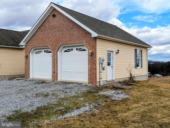 a room with a table and chairs