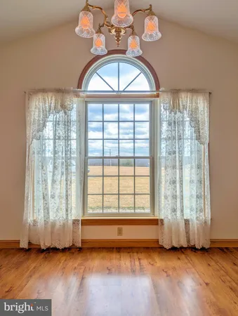 a bathroom with a sink a mirror and a shower