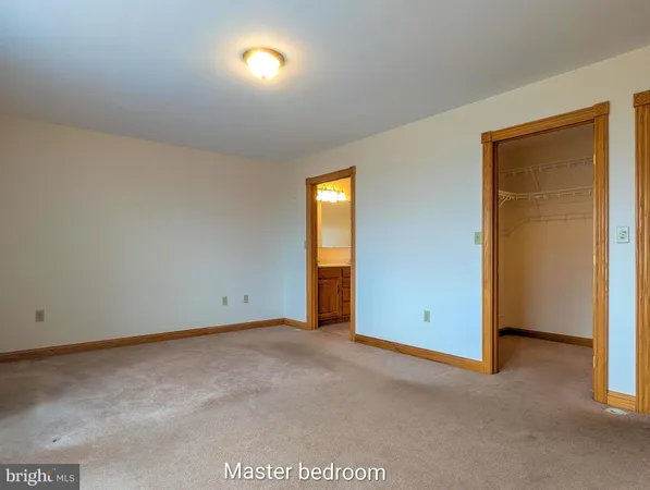 a bathroom with a toilet and a sink