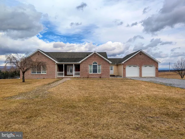 a house with trees in the background
