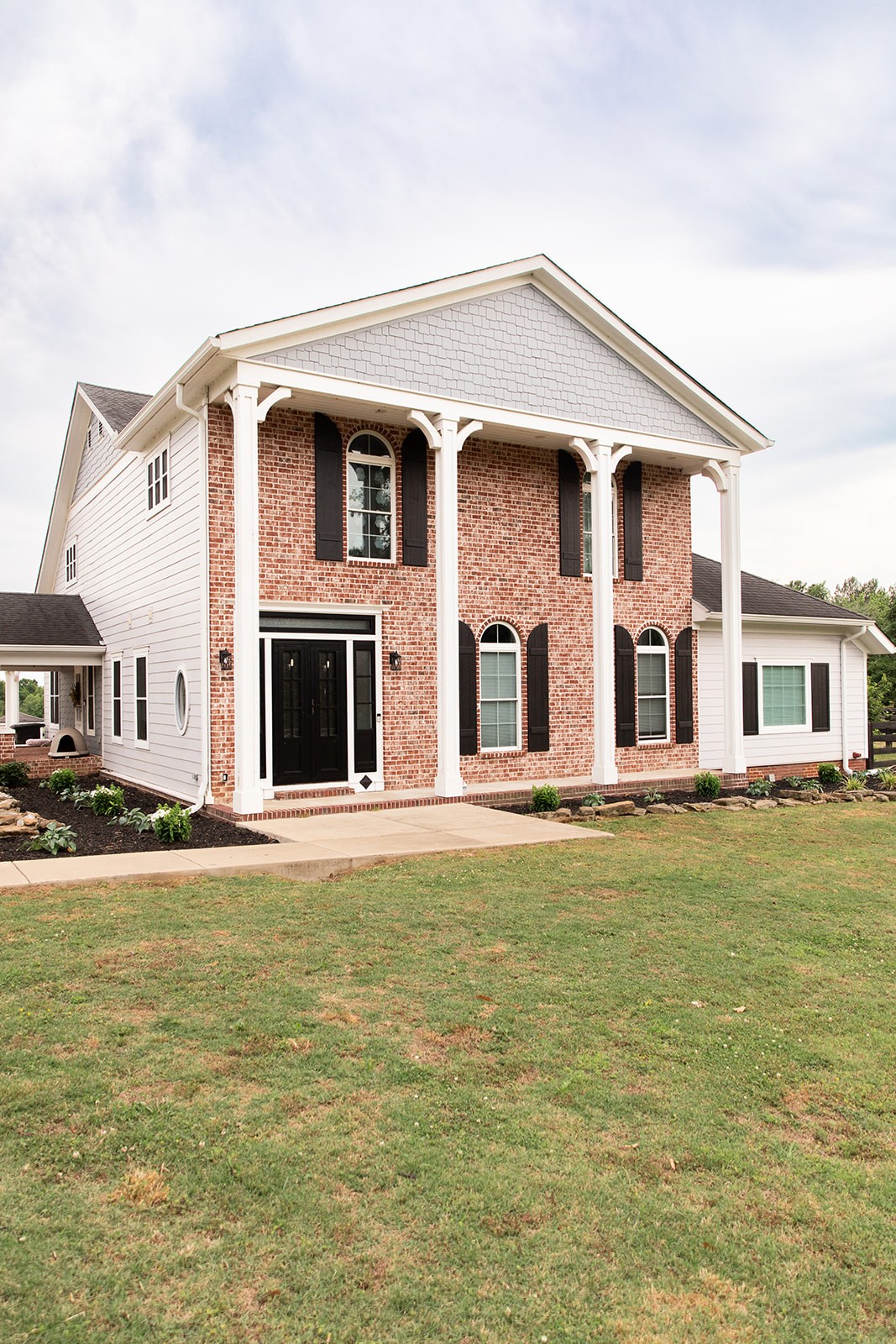 857 Hicks Cut Road Pulaski, TN 38478 - Photo 4 of 80 a front view of a house with a yard