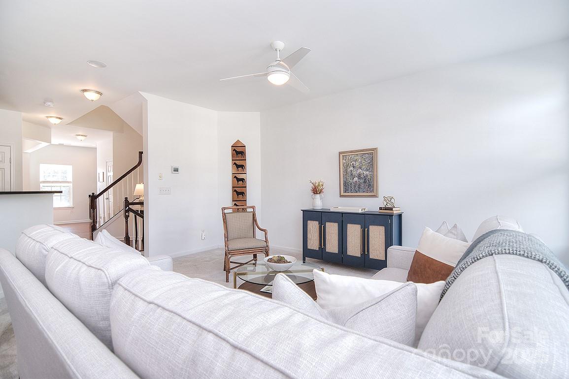 6134 Rockefeller Lane Charlotte, NC 28210 - Photo 23 of 47 a living room with furniture