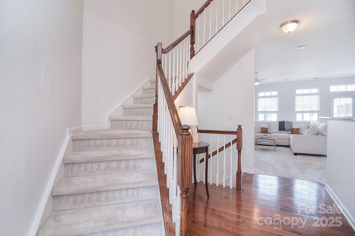6134 Rockefeller Lane Charlotte, NC 28210 - Photo 26 of 47 a view of entryway and hall with wooden floor