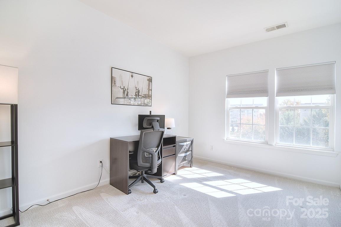 6134 Rockefeller Lane Charlotte, NC 28210 - Photo 28 of 47 a view of a workspace with furniture and a window