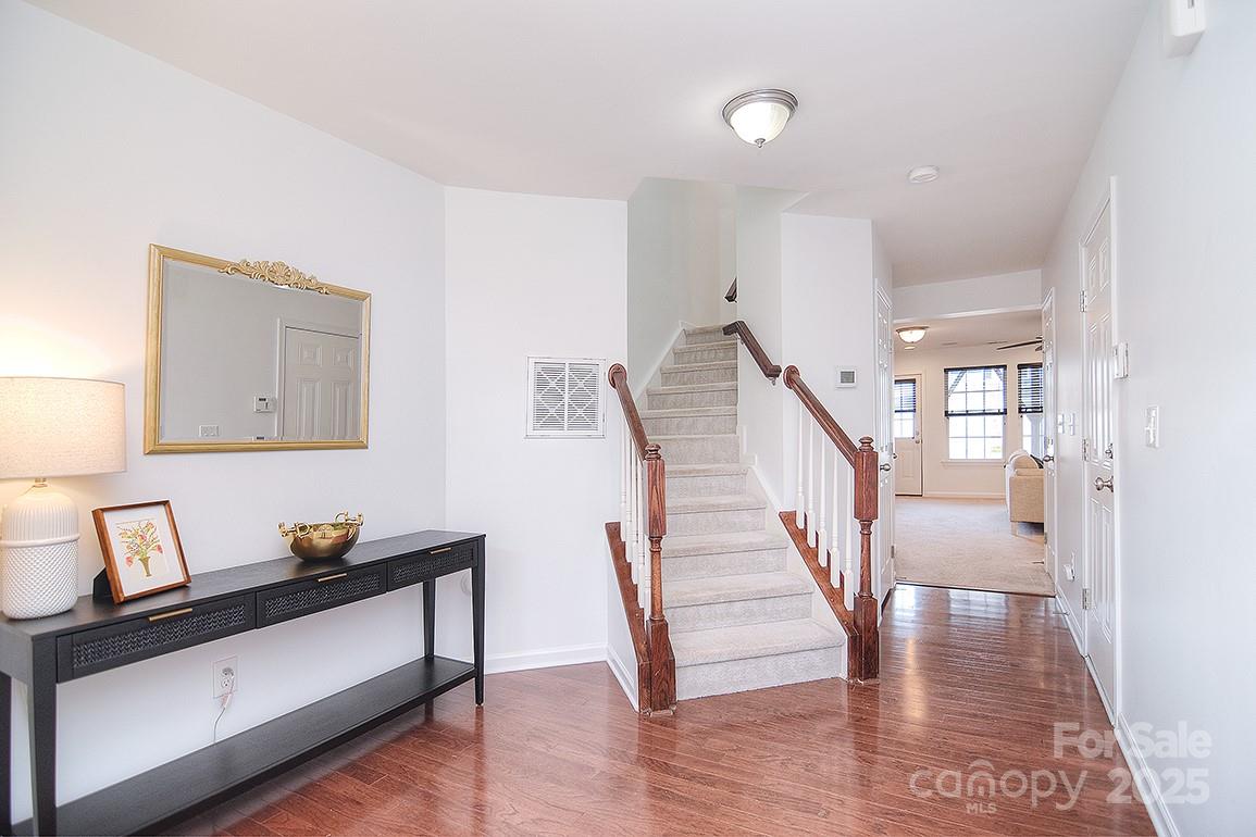 6134 Rockefeller Lane Charlotte, NC 28210 - Photo 3 of 47 a view of room with furniture and wooden floor