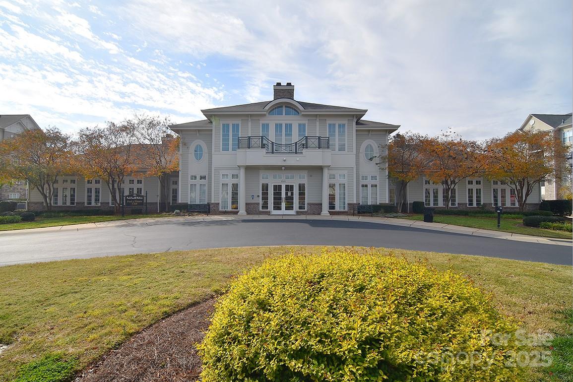 6134 Rockefeller Lane Charlotte, NC 28210 - Photo 39 of 47 a view of a swimming pool in front of the house
