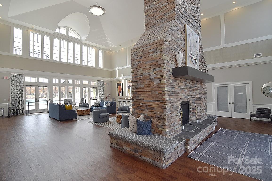 6134 Rockefeller Lane Charlotte, NC 28210 - Photo 40 of 47 a living room with furniture and a fireplace