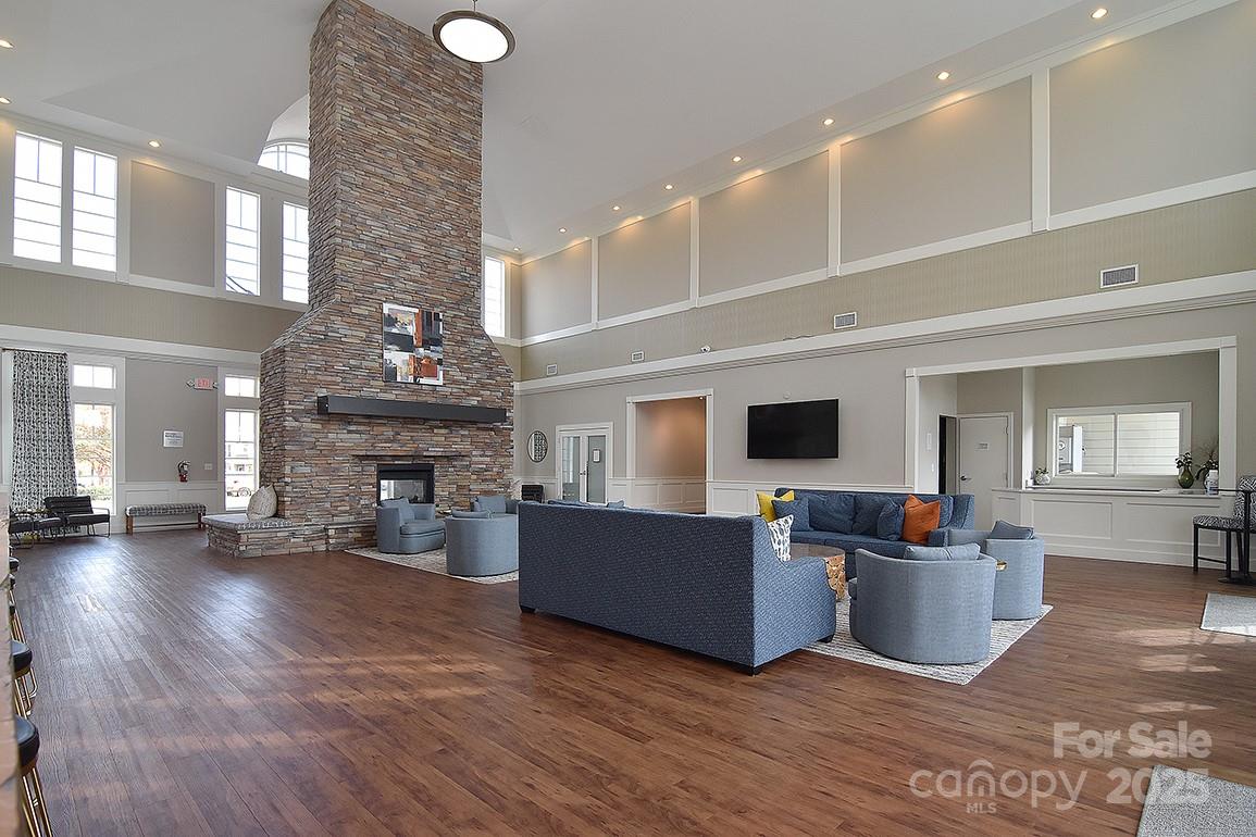 6134 Rockefeller Lane Charlotte, NC 28210 - Photo 41 of 47 a living room with furniture and a fireplace