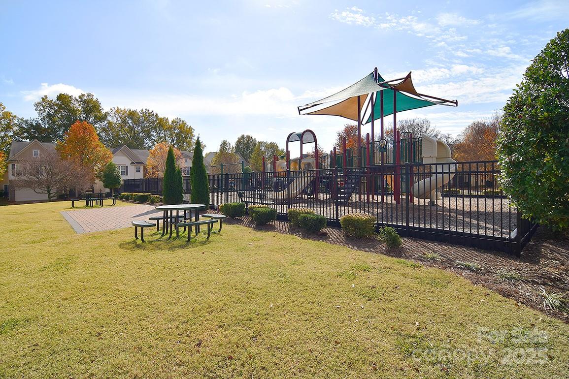 6134 Rockefeller Lane Charlotte, NC 28210 - Photo 42 of 47 a view of a swimming pool with a patio