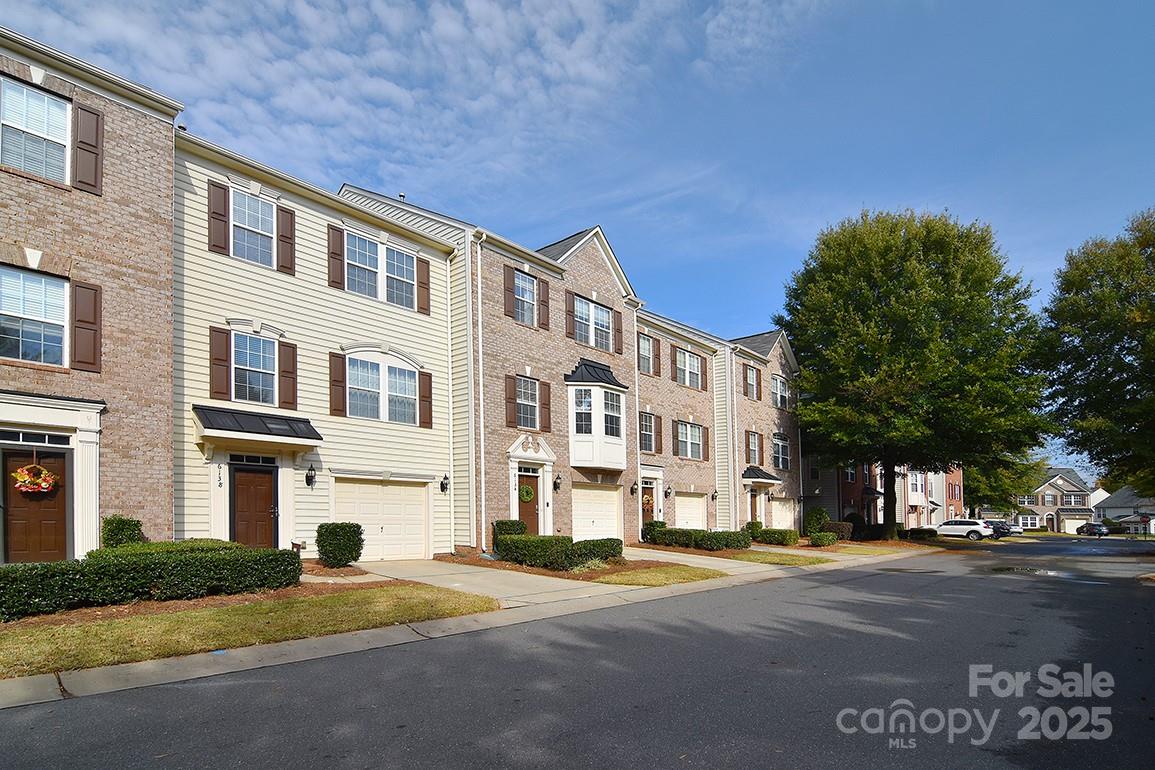 6134 Rockefeller Lane Charlotte, NC 28210 - Photo 44 of 47 a view of a building with a street