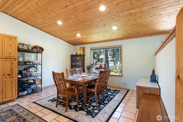 a view of a dining room with furniture