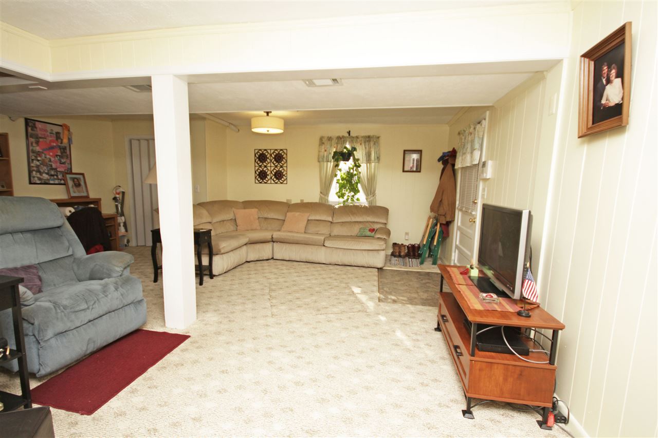 384 Bybee Road Louisa, VA 23093 - Photo 17 of 23 a living room with furniture and a flat screen tv