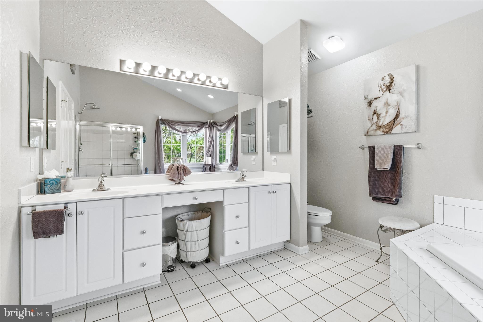 4114 Lomar Terrace Mount Airy, MD 21771 - Photo 40 of 91 a spacious bathroom with a double vanity sink mirror and toilet
