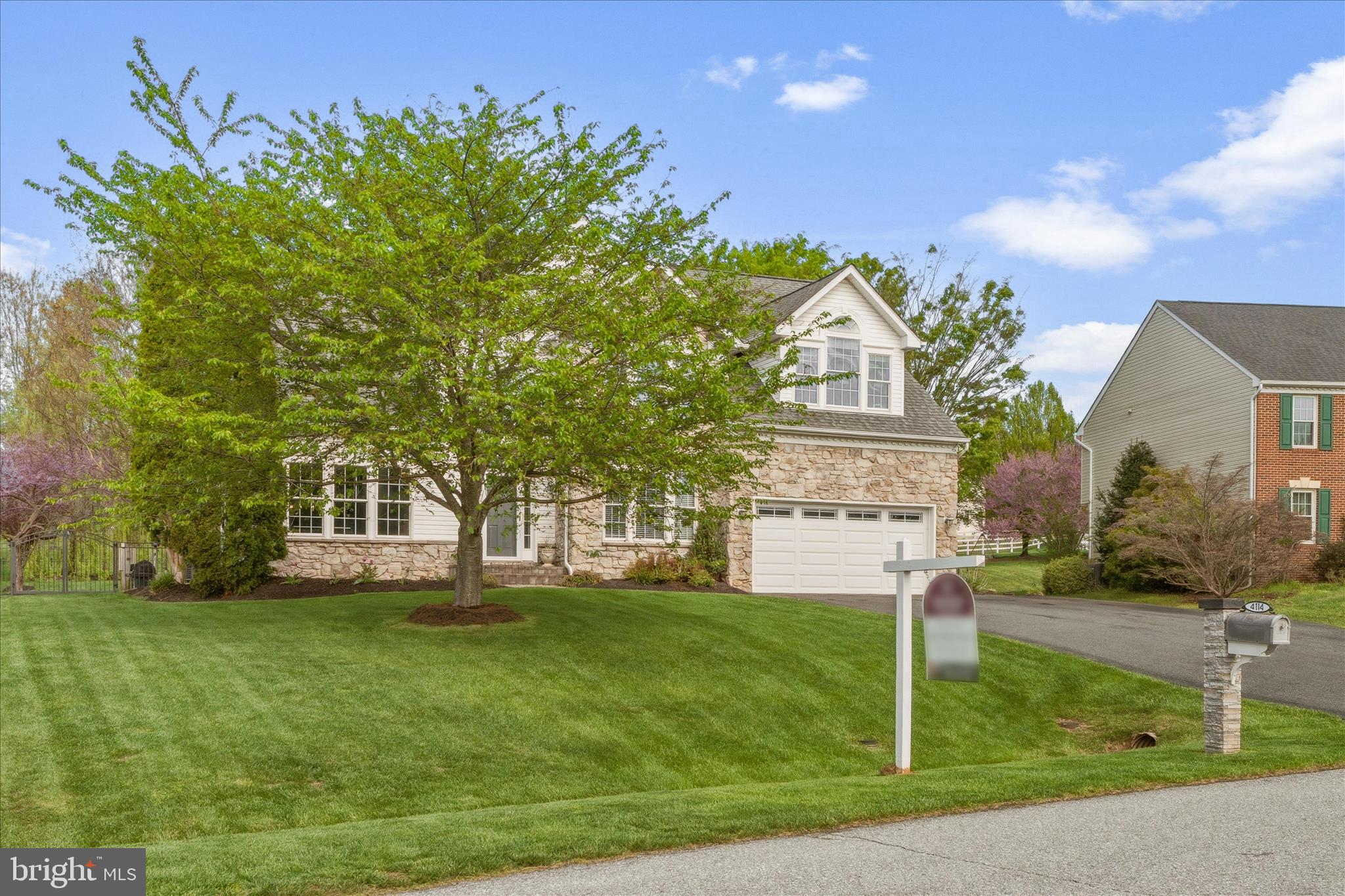 4114 Lomar Terrace Mount Airy, MD 21771 - Photo 4 of 91 a front view of a house with a yard